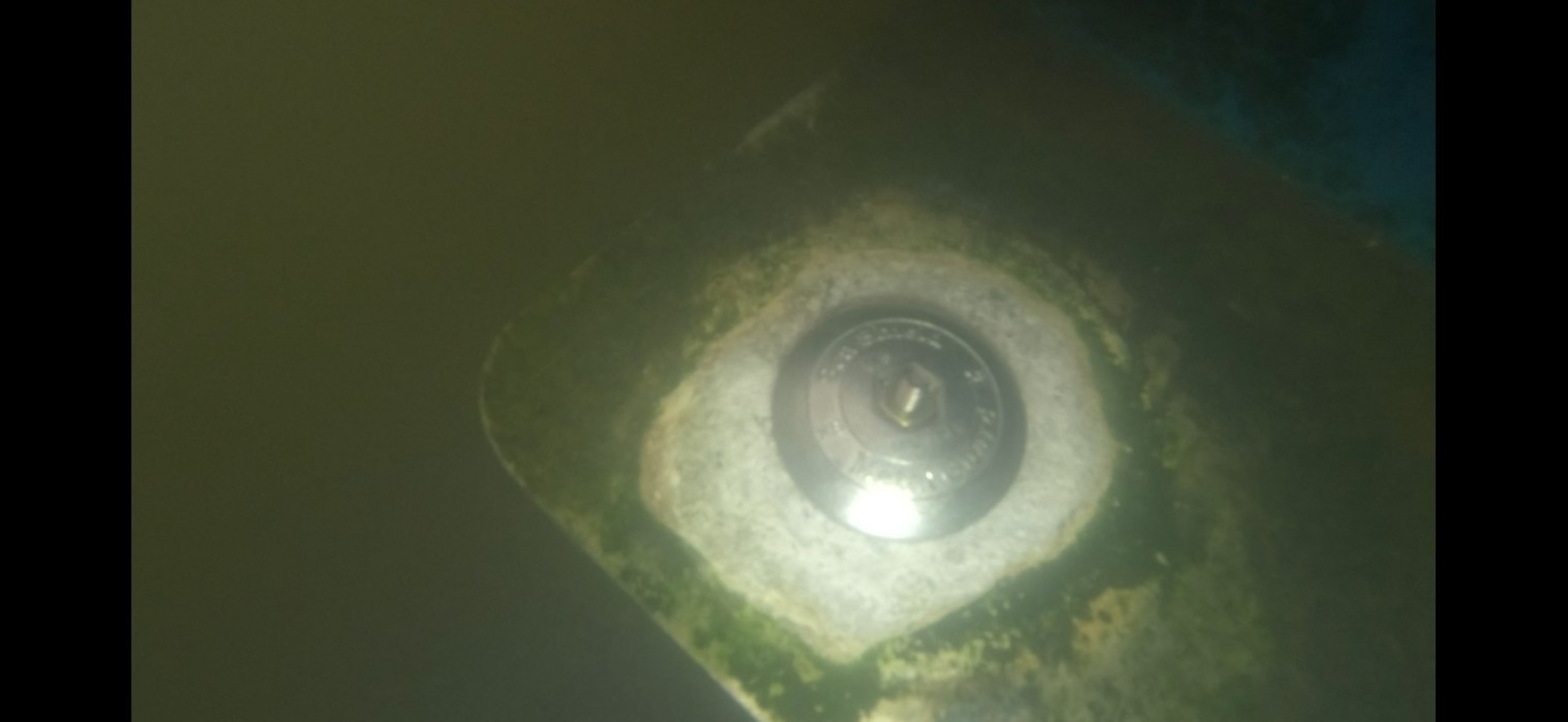 Trim tab anode and surrounding bonding plate area